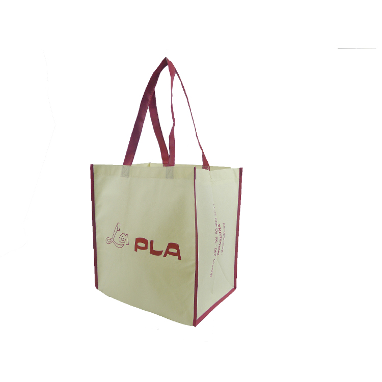 Beige non woven bag with burgundy handles
